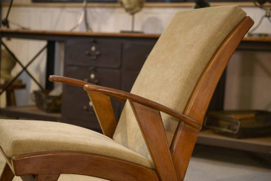 Scandinavian armchair and two 1960s ottomans. (photo 12 of 16)