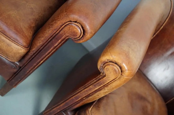 Image 1 of Vintage Nederlandse clubfauteuils van cognackleurig leer, set van 2