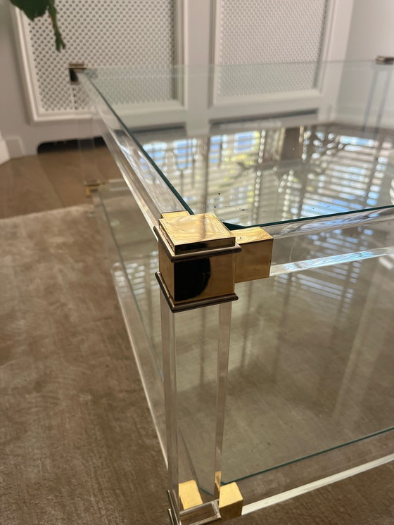 Image 1 of Mid-century glass coffee table with brass accents