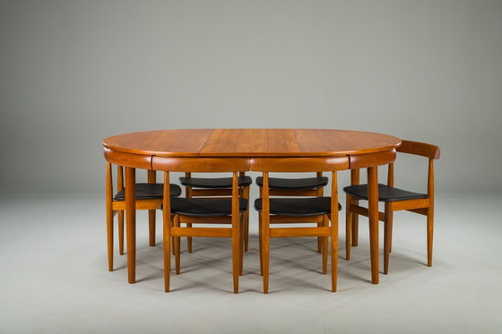Image 1 of Mesa de comedor extensible y sillas danesas de teca de Hans Olsen para Frem Røjle, años 60, juego de 7