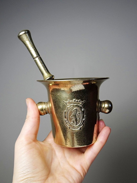 Image 1 of Gilt bronze apothecary's mortar and pestle with heraldic decoration, 20th century