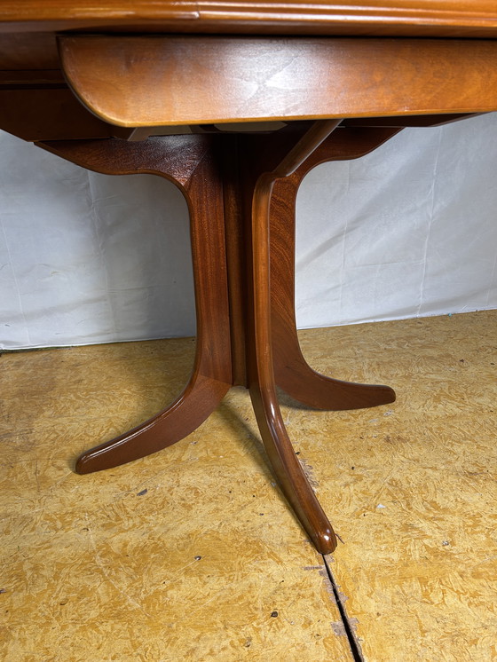 Image 1 of Mid-Century Retro Vintage Teak Extending Round Dining Table by Parker Knoll – 1970  Elegant | Space-Saving | Practical | Iconic 