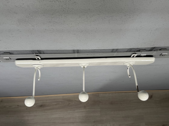 Image 1 of Mid - Century coat rack sleek and timeless design
