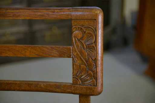 Set van 6 eikenhouten stoelen in de stijl van Pierre Cruège, jaren 1940.