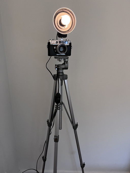 Camera lamp on tripod