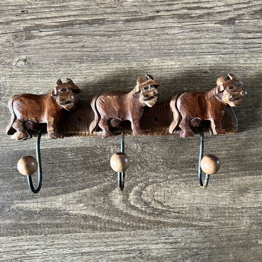 Vintage wooden cow coat rack