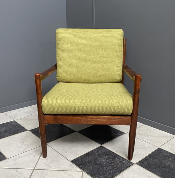 Image 1 of Gele stoffen en houten relaxstoel uit de jaren 60.