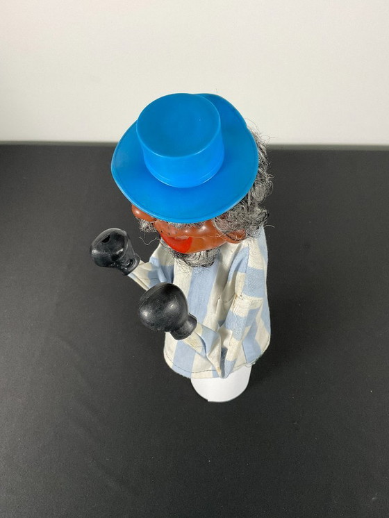 Image 1 of Paar oude bokshandpoppen Aziatische man en clown