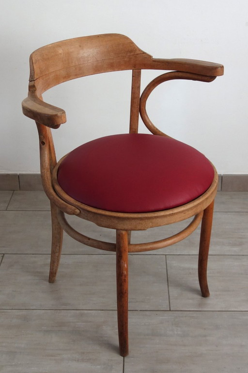 Sillón vintage de madera curvada