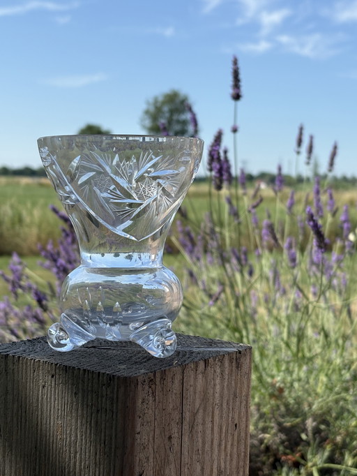 Vintage crystal vase on ball feet