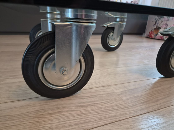 Glass square industrial coffee table on wheels, Transparent (photo 4 of 5)