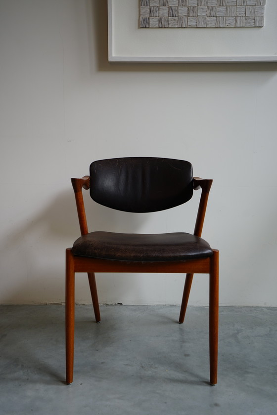 Image 1 of 6 Kai Kristiansen stoelen | Model 42 | Teak Leder patina