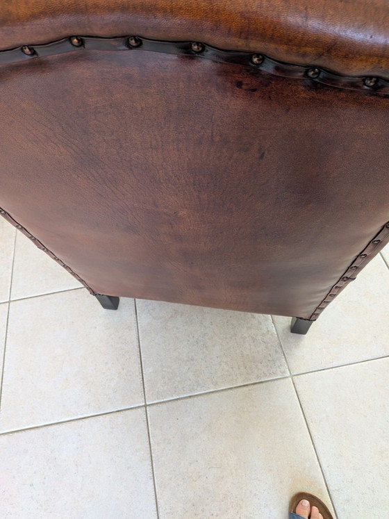 A sheepskin leather wingback armchair in very good condition – lounge Atlier, Metal (photo 9 of 10)