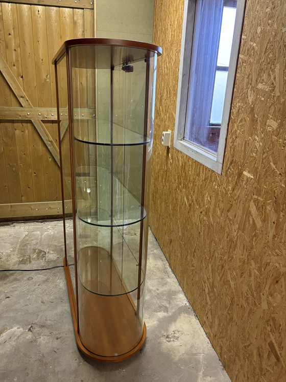 Image 1 of Vintage Fiam Italia oval cherry wood and glass display cabinet