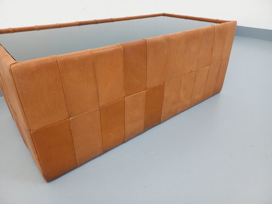 Image 1 of Vintage Swiss rectangular coffee table by De Sede in smoked glass and leather from the 1970s