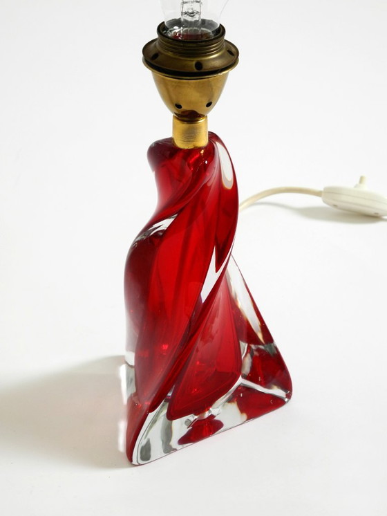 Image 1 of Beautiful heavy mid-century modern table lamp made of solid crystal glass in red and transparent