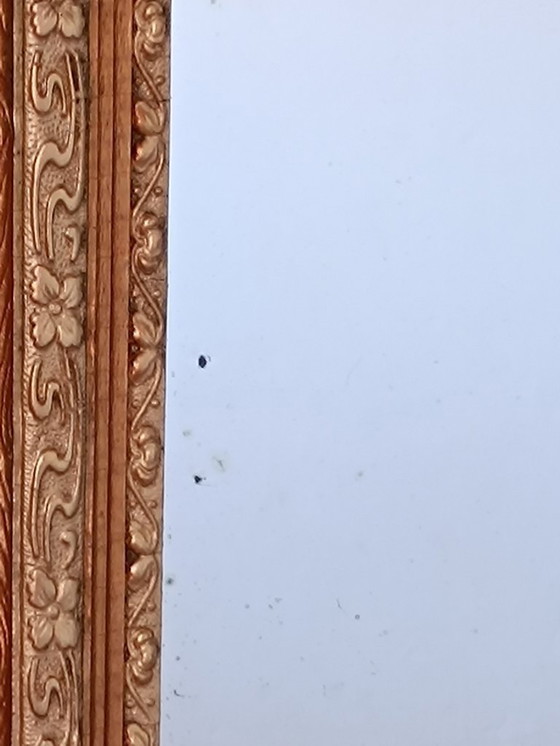 Image 1 of Specchio Napoleone III con ricca decorazione dorata