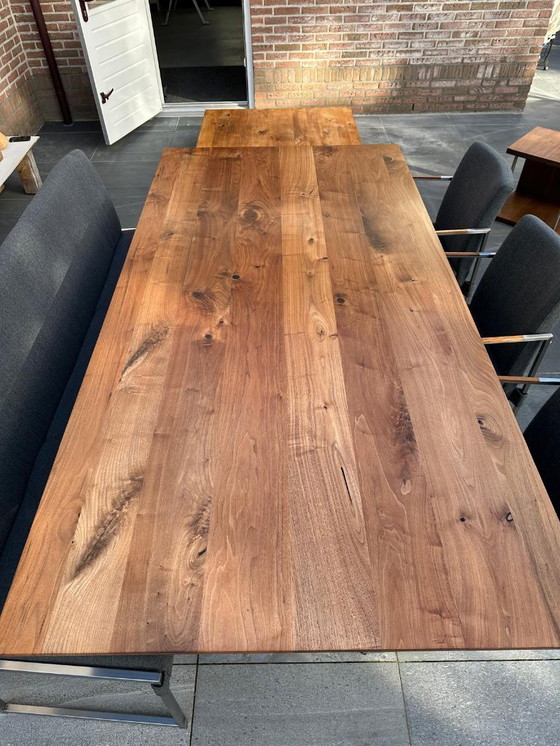 Image 1 of Bert Plantagie Hidden – opgeknapte design eetkamer- en salonset (noten + RVS)