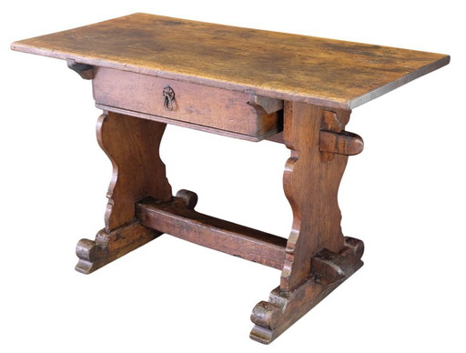 Early German table with drawer.