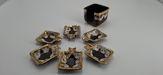 Image 1 of Set of 6 ceramic ashtrays and ashtray holders