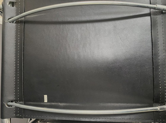 Image 1 of Ensemble de 4 chaises italiennes chromées et en cuir