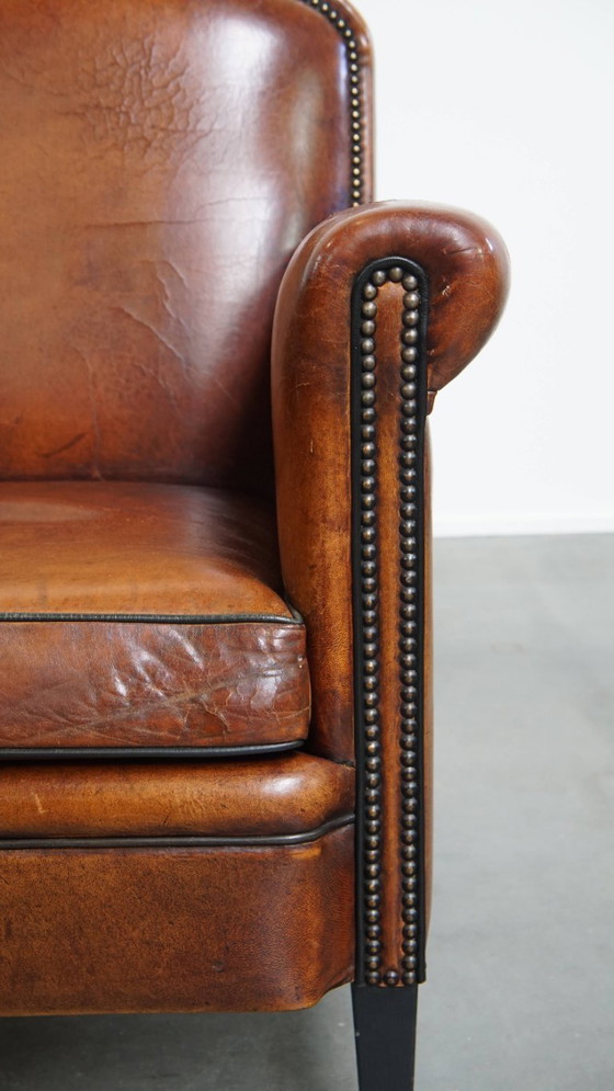 Image 1 of Schapenleren design fauteuil/ armchair in een cognac kleur