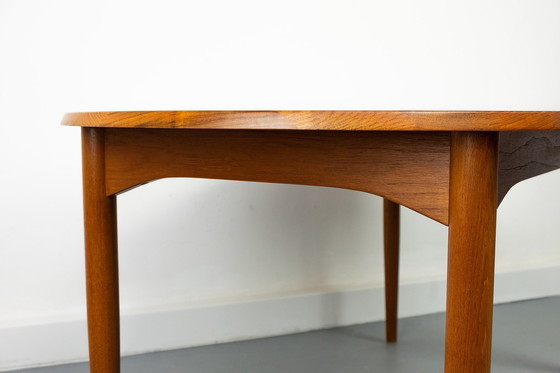 Image 1 of Ovale massief teakhouten eettafel met verlengstukken, jaren 60