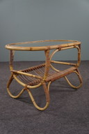 Dutch Design salontafel met wolkglazen blad en lectuurmand