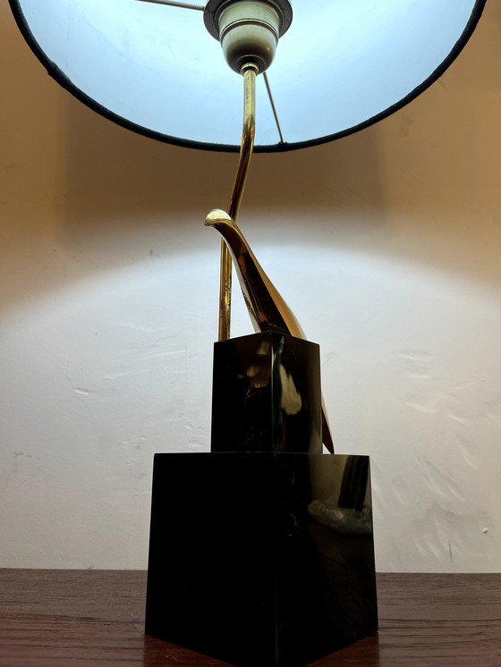 Image 1 of Een messing tafellamp, gesigneerd door Philippe Jean, 1970