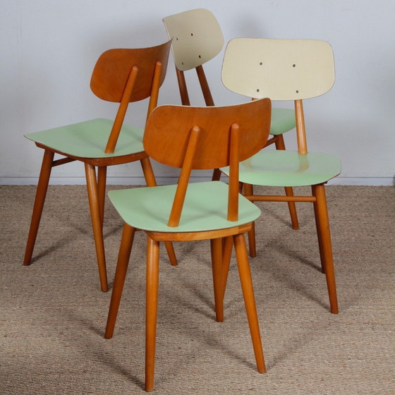 Image 1 of Suite van 4 Vintage houten stoelen, bewerkt door Ton, 1960
