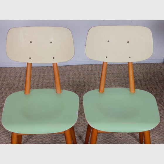 Image 1 of Suite van 4 Vintage houten stoelen, bewerkt door Ton, 1960