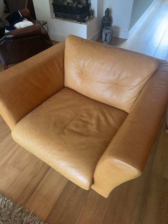 Image 1 of Lederland bank en twee fauteuils