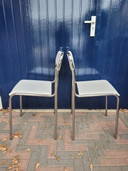 2x Vintage stoelen buisframe