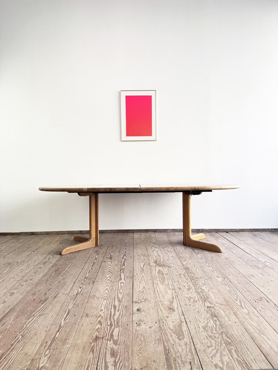 Image 1 of Mid Century Moderne Deense ronde uitschuifbare teakhouten eettafel van Glostrup, 1960