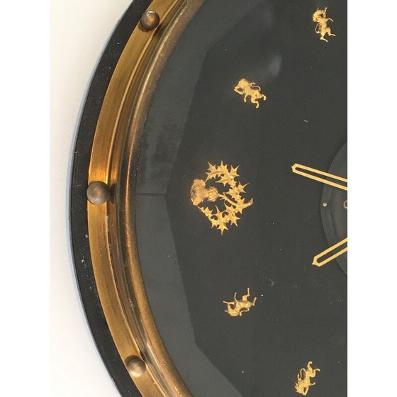 Image 1 of Ronde zwart met gouden vintage wandklok, 1950