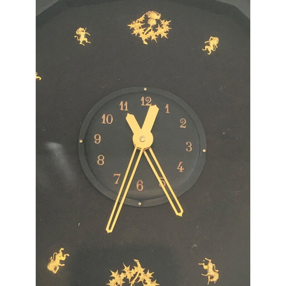 Image 1 of Ronde zwart met gouden vintage wandklok, 1950