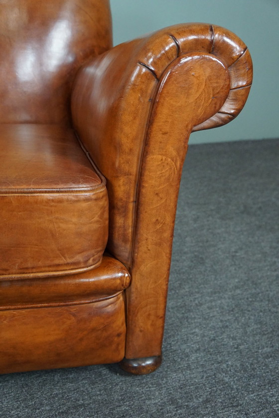 Image 1 of Nieuw gestoffeerde schapenleren fauteuil