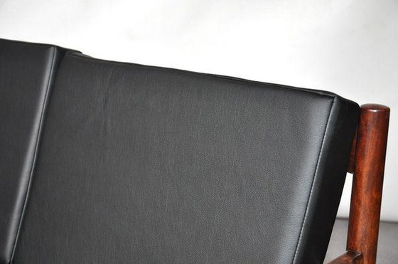 Image 1 of Zwarte bank, vinyl en palissander