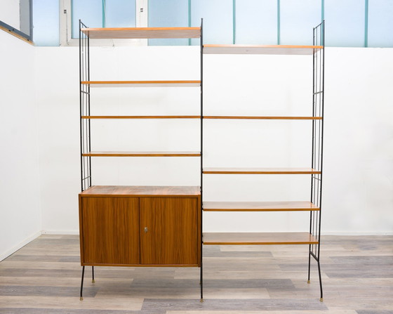 Image 1 of Vrijstaande plank, zwarte metalen ladders, jaren 60