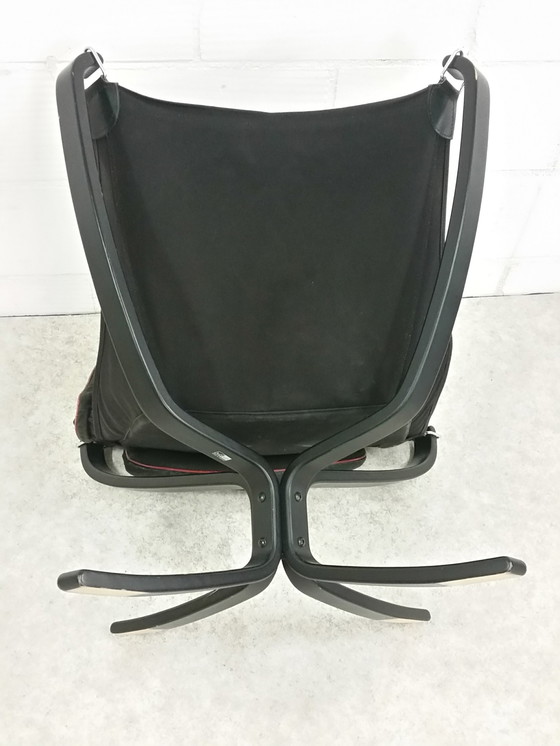 Image 1 of Sigurd Ressel Falcon chair leer met rode bies