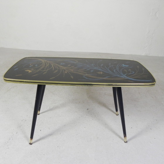 Image 1 of Vintage Salontafel Met Glazen Blad En Schuine Poten, Jaren 50