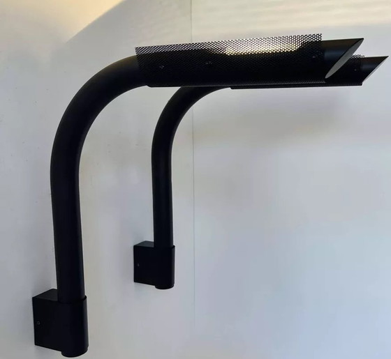 Image 1 of 2X zwarte en geperforeerde metalen wandlampen van Parscot, Frankrijk 1980