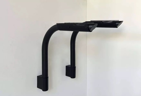 Image 1 of 2X zwarte en geperforeerde metalen wandlampen van Parscot, Frankrijk 1980