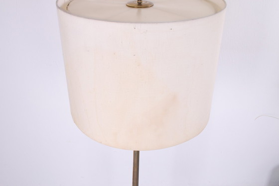 Image 1 of Vintage vloerlamp met gietijzeren voet en messing Duits jaren60s