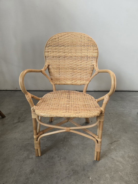 Image 1 of Stapelbare rieten fauteuil voor buiten en horeca