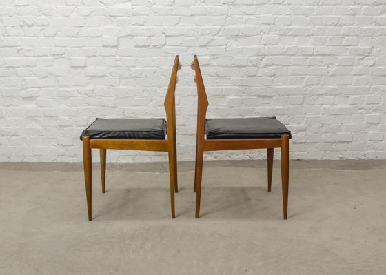 Image 1 of Set van vier massief teakhouten ladder-eetkamerstoelen met vierkante zwarte kunstlederen zitting, jaren 1960