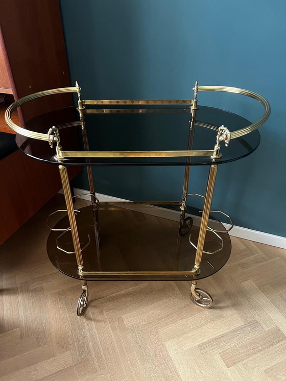 Image 1 of Vintage Messing Barcart Rookglazen Bladen Met Zwenkwielen