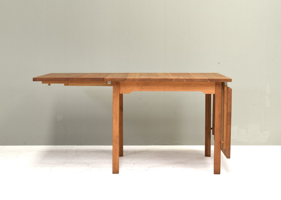 Image 1 of Scandinavische eettafel met uitklapbaar blad in eiken - circa 1970-80