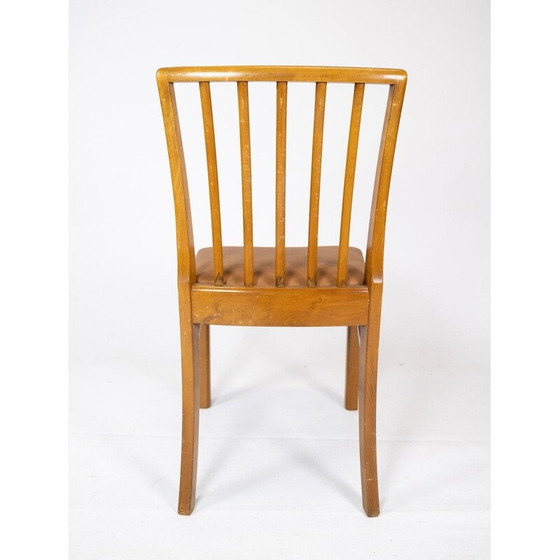 Image 1 of Set van 10 vintage stoelen in licht hout en bekleed met cognac leer jaren 1940