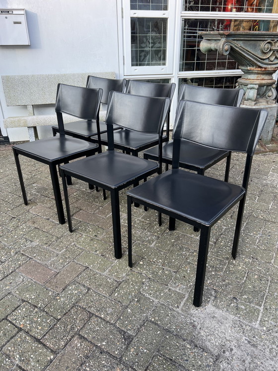 Image 1 of Tuiglederen stoelen uit de jaren 80